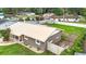 Well-maintained single Gathering home with a metal roof, fenced yard and beautiful green grass at 1520 Ne 17Th Ave, Ocala, FL 34470