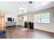 Inviting room features wood flooring, ample windows, and a functional workspace at 1520 Ne 17Th Ave, Ocala, FL 34470