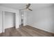 This is a bedroom with wood floors, a ceiling fan, a closet, and white doors and trim at 1628 Se 29Th Ter, Ocala, FL 34471