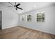 Spacious bedroom featuring a ceiling fan, recessed lighting, and hardwood floors at 1628 Se 29Th Ter, Ocala, FL 34471