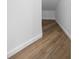 Small walk-in closet with light wood flooring at 1628 Se 29Th Ter, Ocala, FL 34471