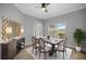 Cozy dining room with decorative mirror, wood floors and an outdoor view at 1628 Se 29Th Ter, Ocala, FL 34471