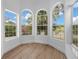 Bright sitting area boasts large windows and pretty views of the surrounding neighborhood at 1628 Se 29Th Ter, Ocala, FL 34471