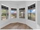 Bright sitting area with multiple windows and lovely views of the surrounding community at 1628 Se 29Th Ter, Ocala, FL 34471
