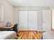 Shared bedroom featuring a desk and closet, perfect for multiple occupants or guests at 17890 Se 96Th Ct, Summerfield, FL 34491
