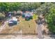 Aerial view showing the property with a fenced yard, multiple structures, and a swimming pool at 1839 Cr 543A, Sumterville, FL 33585