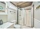 Well-lit bathroom featuring a glass-enclosed shower, toilet, and sink at 1839 Cr 543A, Sumterville, FL 33585