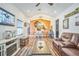 Spacious living room showcasing wood floors, modern decor, and an open layout ideal for entertaining and Gathering gatherings at 1839 Cr 543A, Sumterville, FL 33585