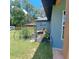 Green yard featuring garden art and a view of the house at 1839 Cr 543A, Sumterville, FL 33585
