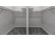 Walk-in closet with ample shelving, providing plenty of storage space at 2050 Nw 79Th Loop, Ocala, FL 34475