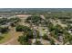 A residential area featuring mature trees and homes surrounded by natural beauty and paved roadways at 2819 Ne 32Nd Pl, Ocala, FL 34479
