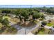 A neighborhood aerial view of a home with mature trees, a front yard, and a shed at 2819 Ne 32Nd Pl, Ocala, FL 34479