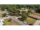 A home and neighborhood featuring mature trees, well maintained lawns, and paved roads at 2819 Ne 32Nd Pl, Ocala, FL 34479