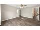 Bedroom featuring hardwood floors, natural light, ensuite bathroom and closet at 2819 Ne 32Nd Pl, Ocala, FL 34479
