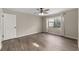 Bedroom featuring hardwood floors, natural light, neutral paint color and a window with curtains at 2819 Ne 32Nd Pl, Ocala, FL 34479