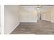 Bright, open living space featuring wood-look flooring and neutral paint at 2819 Ne 32Nd Pl, Ocala, FL 34479