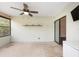 Enclosed sunroom with ceiling fan and access to the backyard at 2819 Ne 32Nd Pl, Ocala, FL 34479