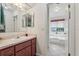 Bathroom with a bathtub and view from the window at 36 Gordon Ct, Leesburg, FL 34788