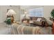 Cozy living room featuring comfortable seating and a bright window at 36 Gordon Ct, Leesburg, FL 34788