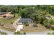 Aerial view of a charming home with fenced yard and mature landscaping at 361 Oak Lane Drive Dr, Ocala, FL 34472