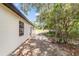 Charming brick patio and lush landscaping create a serene outdoor space at 361 Oak Lane Drive Dr, Ocala, FL 34472