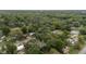 Aerial view featuring homes, trees and quiet neighborhood streets at 3800 Ne 24Th Ct, Ocala, FL 34479