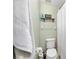 Bathroom with toilet and shower with a curtain at 3800 Ne 24Th Ct, Ocala, FL 34479