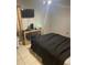 Bedroom with wood style flooring and decor at 3800 Ne 24Th Ct, Ocala, FL 34479