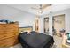 Bedroom with a fan and spacious closet at 3800 Ne 24Th Ct, Ocala, FL 34479
