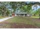 Cozy home with shed and tree house in the front yard at 3800 Ne 24Th Ct, Ocala, FL 34479