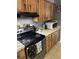 Functional kitchen with stainless steel appliances and plenty of cabinet space at 3800 Ne 24Th Ct, Ocala, FL 34479