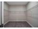 Walk-in closet features wire shelving for ample storage in neutral color scheme at 5830 Sw 121St Ter, Ocala, FL 34481