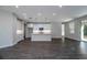 Bright and airy living space featuring modern lighting and an open floor plan at 5830 Sw 121St Ter, Ocala, FL 34481