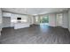 Spacious living area with sliding glass doors leading to the outdoor space at 5830 Sw 121St Ter, Ocala, FL 34481
