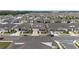 Expansive aerial view of a new residential community featuring well-maintained homes and green spaces at 6486 Sw 75Th Avenue Rd, Ocala, FL 34474