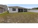 View of backyard, enclosed lanai and neighboring properties at 6486 Sw 75Th Avenue Rd, Ocala, FL 34474