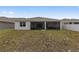 View of backyard, enclosed lanai and neighboring properties at 6486 Sw 75Th Avenue Rd, Ocala, FL 34474