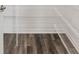 Close-up of a walk-in closet with wire shelving and wood-look floors at 7638 Sw 60Th St, Ocala, FL 34474