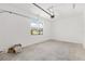 Clean garage with a window providing natural light, and ample space at 7638 Sw 60Th St, Ocala, FL 34474