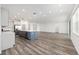 Spacious kitchen with a large island, stainless steel appliances, and recessed lighting at 7638 Sw 60Th St, Ocala, FL 34474