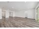 Spacious living room with wood flooring and recessed lighting at 7638 Sw 60Th St, Ocala, FL 34474