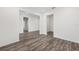 Living room featuring neutral walls and wood-look floors at 7638 Sw 60Th St, Ocala, FL 34474