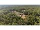 Overhead view of home nestled in serene wooded area with ample privacy at 8200 Sw 125Th Court Rd, Dunnellon, FL 34432