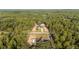 Wide overhead view of home and ample yard surrounded by dense forest at 8200 Sw 125Th Court Rd, Dunnellon, FL 34432