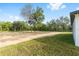 A view of the lawn showing lush green grass and beautiful surrounding trees at 8200 Sw 125Th Court Rd, Dunnellon, FL 34432