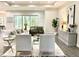 Stylish living room featuring recessed lights, modern furnishings, and sliding glass doors at 8290 Nw 17Th Cir, Ocala, FL 34475