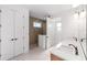 Modern bathroom with double sinks, tile shower, and ample storage space at 8465 Sw 101St Ave, Ocala, FL 34481