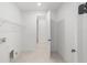 Bright walk-in closet with white walls and wire shelving, offering ample storage space at 8465 Sw 101St Ave, Ocala, FL 34481