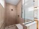 Modern shower with tile surround, a glass enclosure and a built-in bench at 8465 Sw 101St Ave, Ocala, FL 34481
