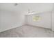 Spacious bedroom featuring a ceiling fan, neutral paint, and carpet flooring at 8998 Sw 94Th St # D, Ocala, FL 34481